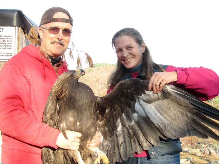 John and Giselle Smisko with a Golden Eagle